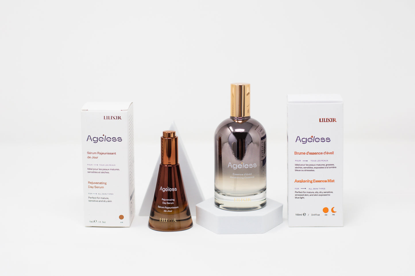 Lilixir ageless rejuvenating serum and awakening essence skincare products on a white background