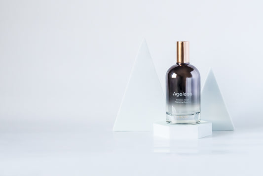 LILIXIR Ageless Awakening Essence  product packaging with branding and product details on a light gray background