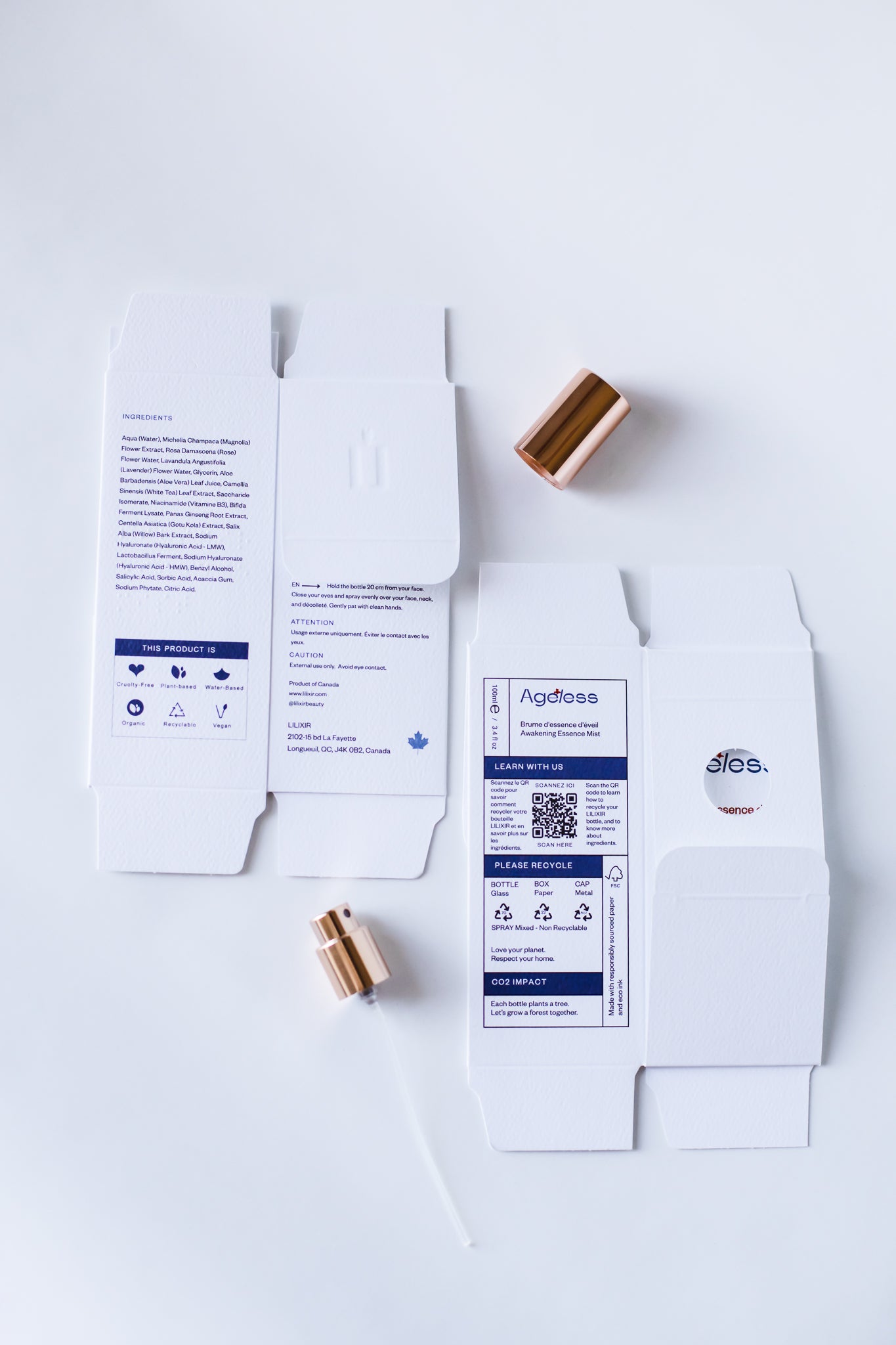 White LILIXIR Ageless Awakening Essence flat packaging with labels and gold cap and spray on a white background